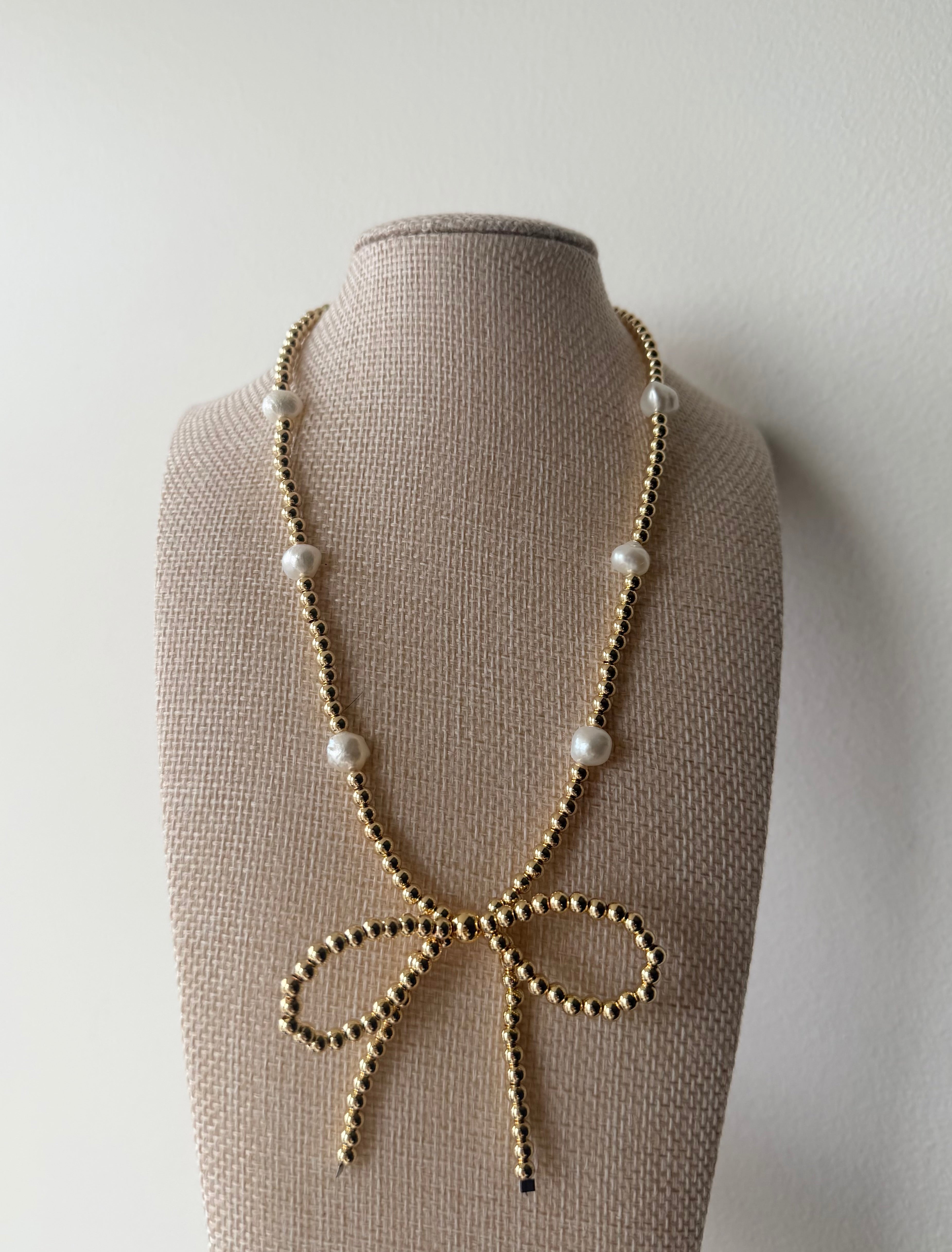 Gold Pearl Bow