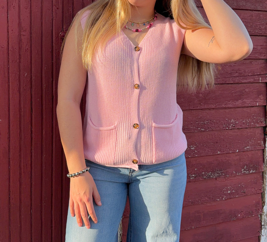 Pink sweater vest