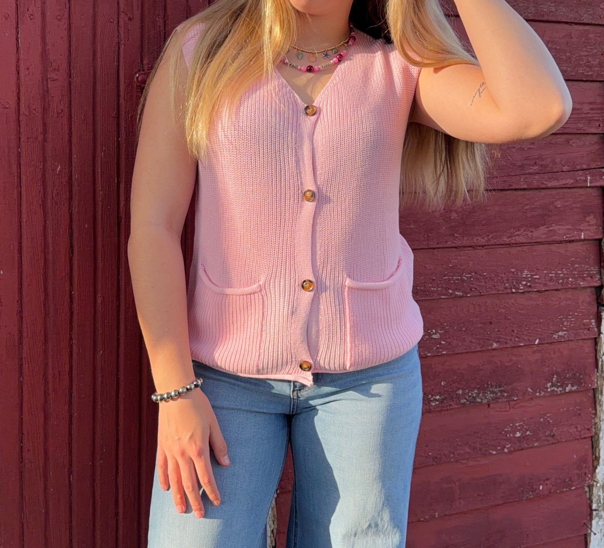 Pink sweater vest