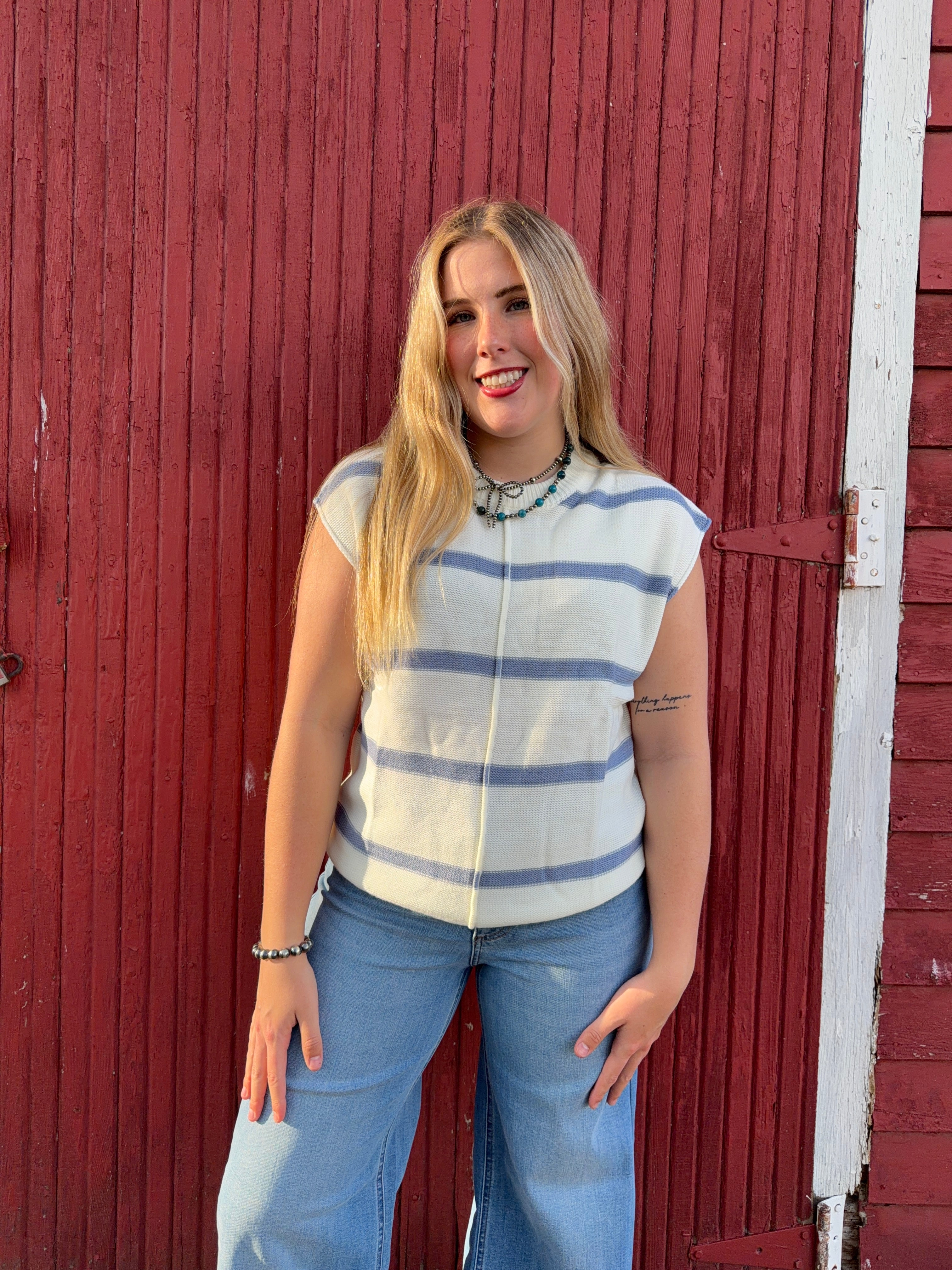 Blue and white sweater vest