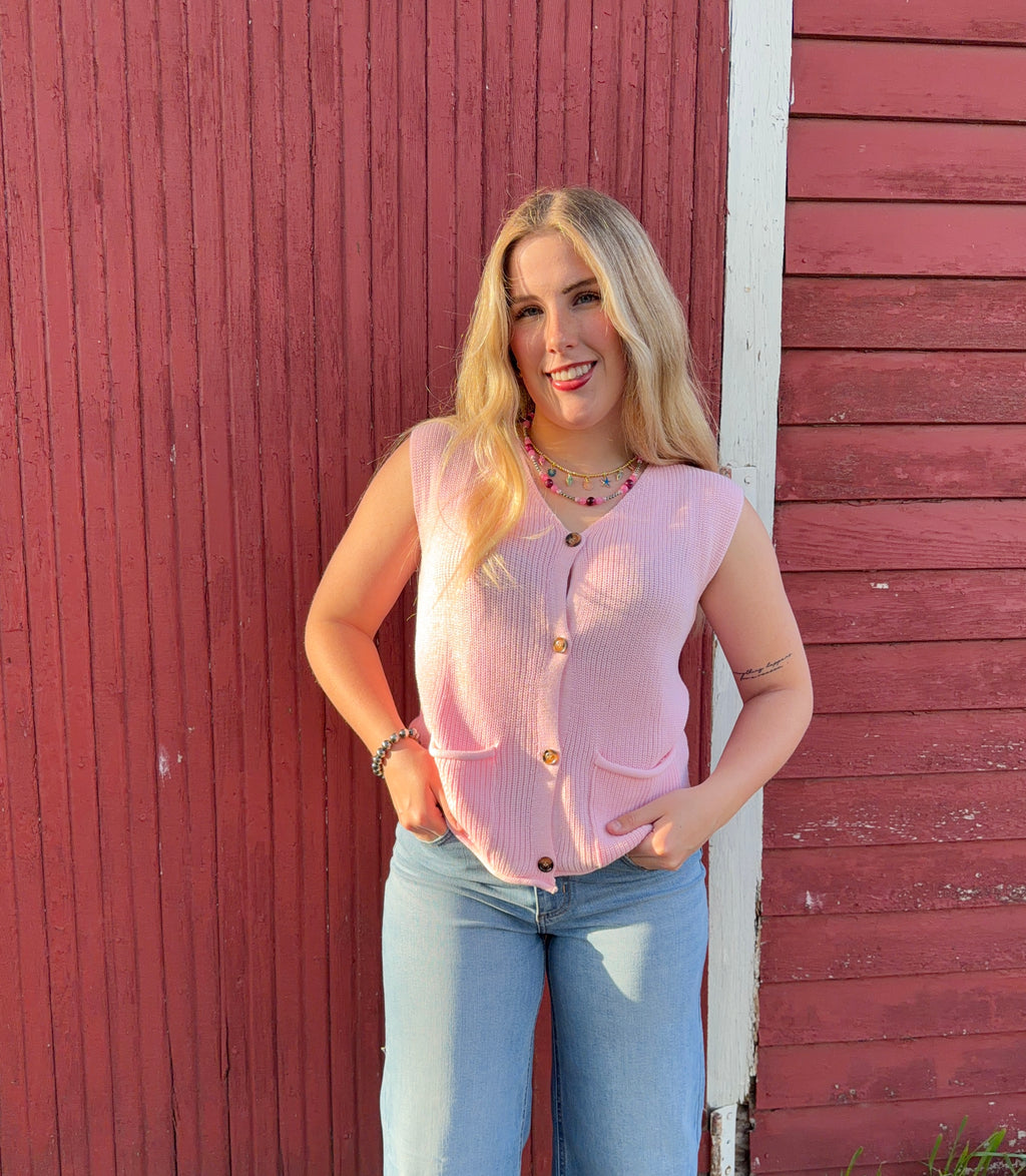Pink sweater vest