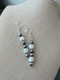 White pearl earrings